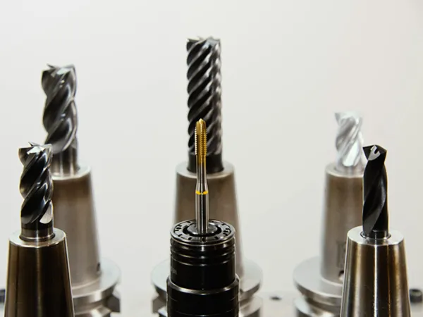 A detailed view of different drill bits used in industrial machining applications.